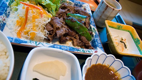 Meal of Bungo yaki niku fried local Kyushu beef Japan