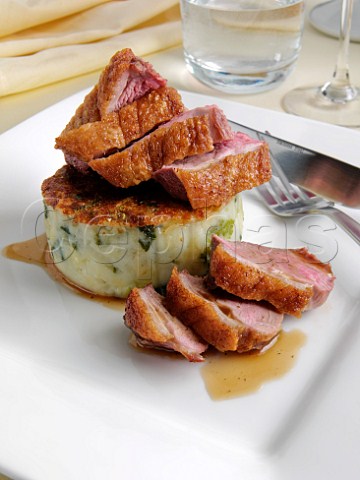 Duck breast on bubble and squeak