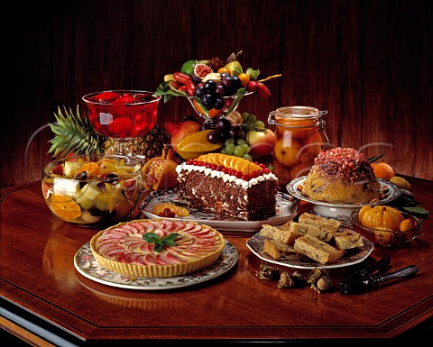 Table full of desserts tart and fruits