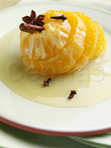 Baked orange with cloves anise and cinnamon