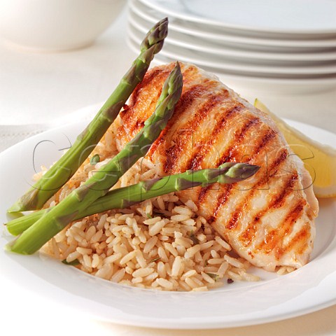 Grilled chicken breast asparagus spears and rice