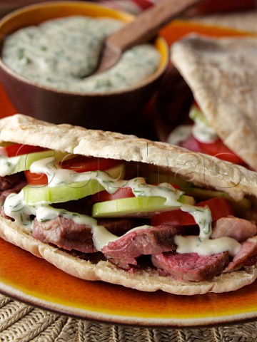 Grilled lamb in pitta bread with dill sauce