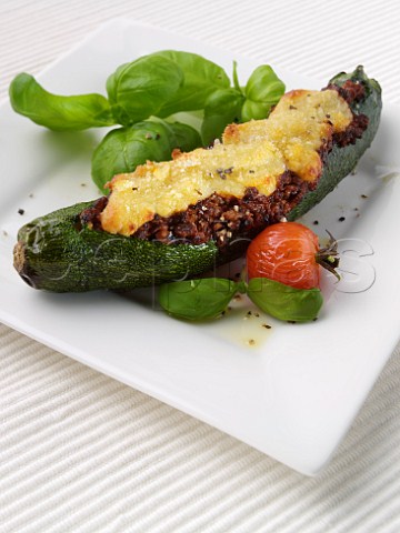 Quorn stuffed courgette with grilled cheese topping and tomato