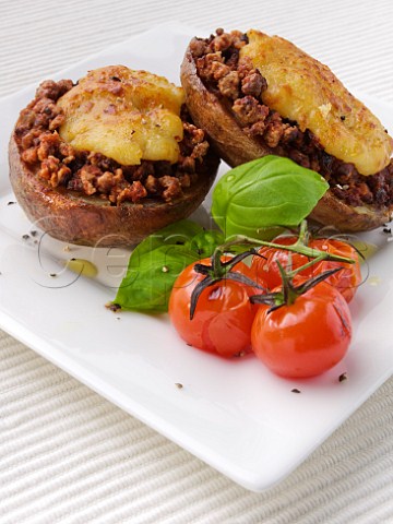 Quorn stuffed mushrooms with grilled cheese topping and tomatoes