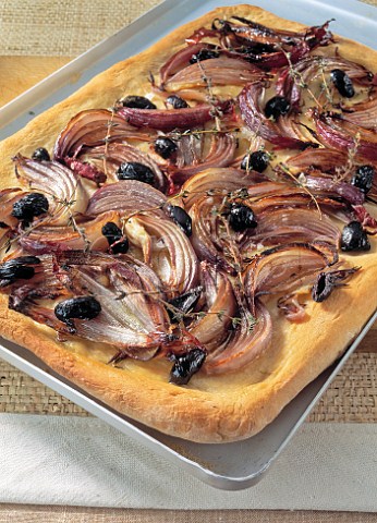 Baked red onion and olive tart