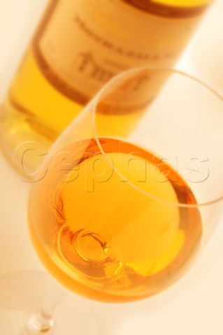 Glass and bottle of dessert wine