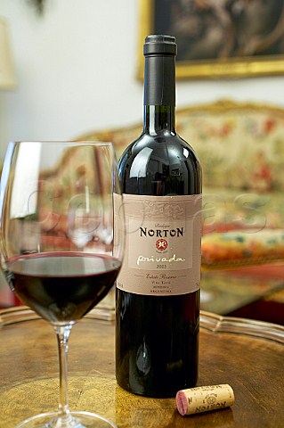 Bottle and glass of Bodega Norton Lujn de Cuyo Privada 2003 wine Argentina Mendoza