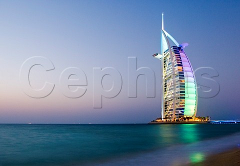 Burj al Arab hotel at dusk Jumeirah Beach Dubai United Arab Emirates