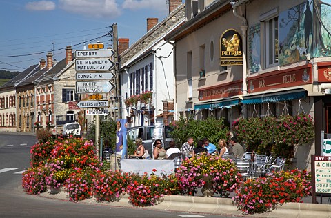 Colourful flower boxes by the roadside outside a brasserie in Vertus Marne France Cte des Blancs  Champagne