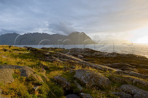 Sunset at coast near Brenna Austvgya Lofoten Islands Norway