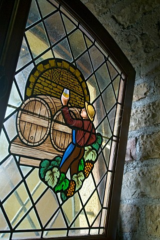 Stained glass window depicting ancient wine making techniques in the caveau and restaurant LAlambic NuitsStGeorges Cte dOr France