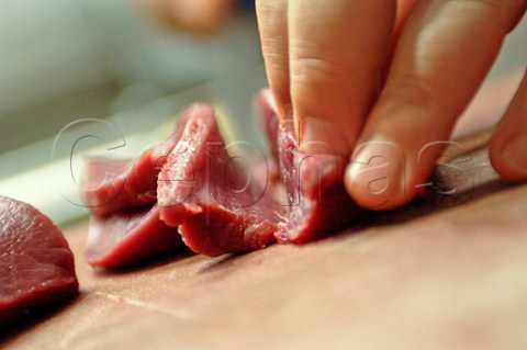 Slicing raw beef