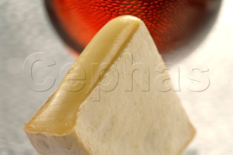 Reblochon cheese with glass of Chimay Red beer