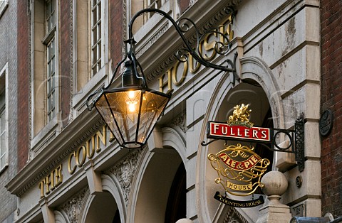 Fullers pub sign advertising Ale and Pie outside the Counting House pub Cornhill City of London