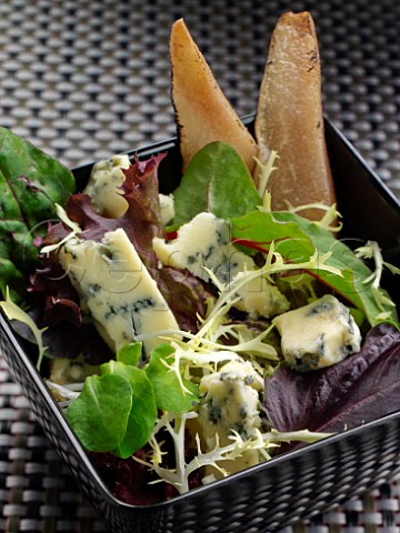 Pear and stilton on mixed green salad