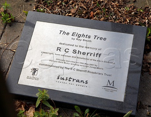 Plaque marking The Eights Tree rowing sculpture by Ray Smith on the River Thames next to Molesey Boat Club East Molesey Surrey England