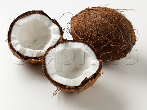 Whole and two half coconuts