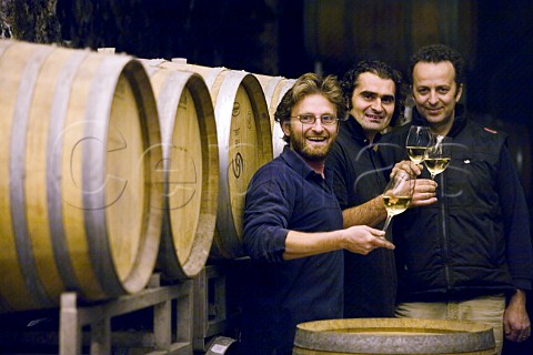 Winery workers tasting Gavi wine in the cellars of Villa Sparina Monterotondo Gavi Piemonte Italy Gavi