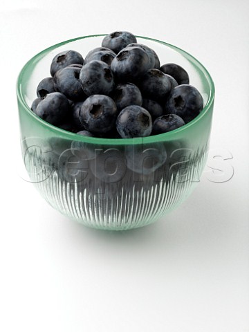 Glass of blueberries