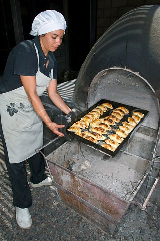 Freshly baked cheese empanadas taken from the oven in restaurant of Familia Zuccardi Mendoza Argentina