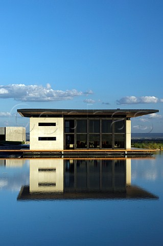 Restaurant of Bodega OFournier with reflection in irrigation lake  Uco Valley Mendoza Argentina