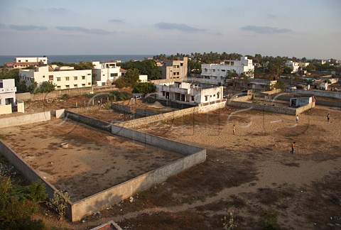 View across building land at Laxmana Nagar Kottivakkam Chennai Madras out to the Bay of Bengal India