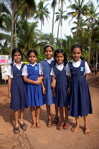 Young Indian girls in their school uniforms at Costa Malabari near Kannur Cannanore on the CochinMysore  CochinGoa route North Kerala India