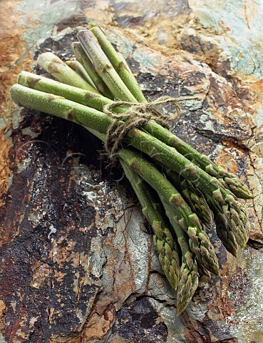Asparagus spears on stone