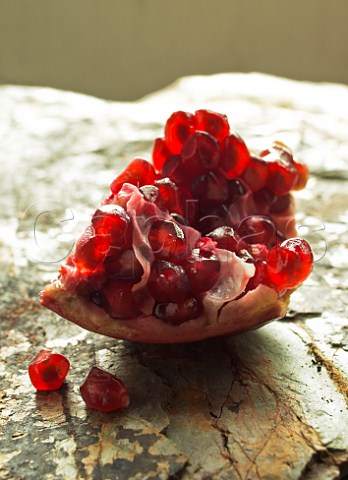 Pomegranate on stone