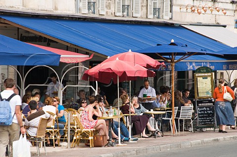 Restaurants lining the edge of the marina in the ancient port of La Rochelle CharenteMaritime France
