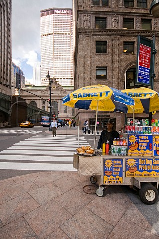 Hot dog and pretzel vendor near Grand Central Station New York USA