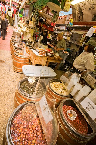 Olives on sale at the Indoor food and produce market Little Italy The Bronx New York USA