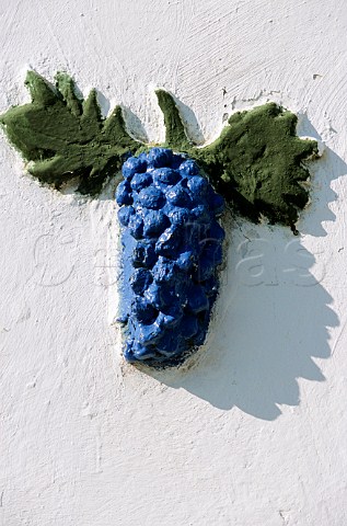 Detail of bunch of grapes adorning a house Palkonya Hungary Villany