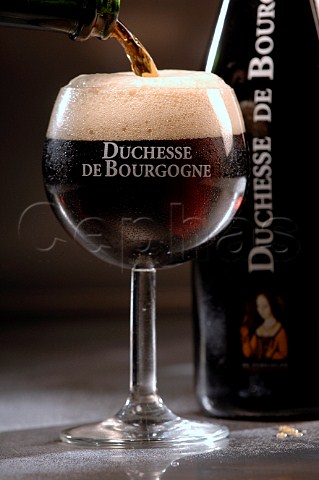 Pouring glass of Duchesse de Bourgogne Belgian beer