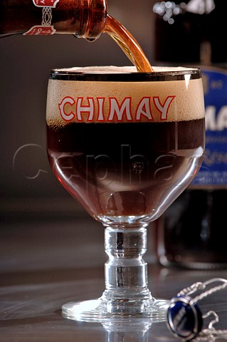 Pouring glass of Chimay Capsule Bleue Trappist Belgian beer