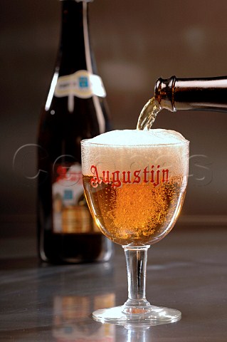 Pouring glass of Augustijn Belgian beer