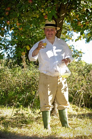 John Riddle of Riddles Cider in a cider apple orchard in South Gloucestershire  England