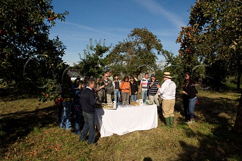 John Riddle conducts a public visit to a cider apple orchard of Riddles Cider Gloucestershire England