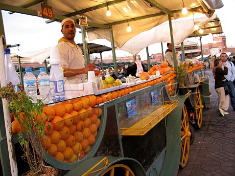 Orange juice stall in Marrakech souk Morocco