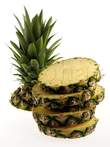 A cut pineapple on a white background