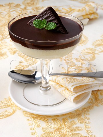 A glass of chocolate mint mousse dessert
