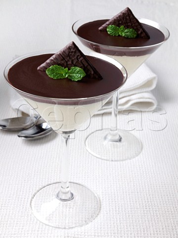 Two glasses of chocolate mint mousse dessert