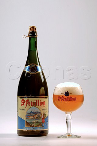 Bottle and glass of St Feuillien Tripel Belgian beer