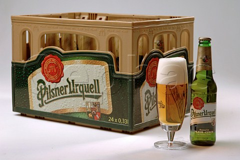 Glass bottle and crate of Pilsner Urquell lager beer