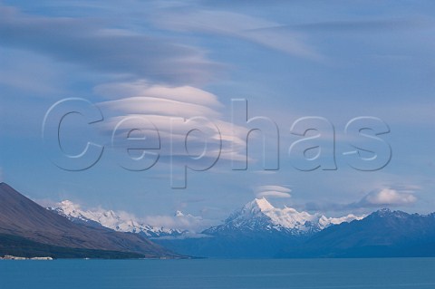 Dramatic clouds over Mt Cook and Lake Pukaki at dawn South Island New Zealand