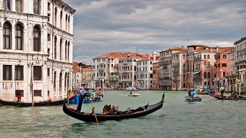 Gondola on Grand Canal near Rialto Bridge Venice Italy