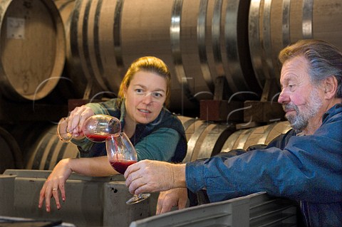 Winemakers Dick and Luisa Ponzi in barrel cellar at Ponzi winery  Beaverton Oregon USA  Willamette Valley