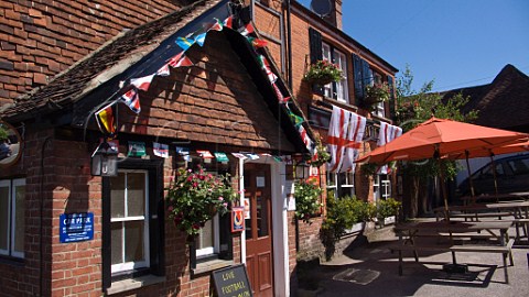 St Georges flags outside the Bull Inn Limpsfield Surrey England