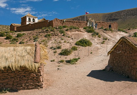 Church and houses built from local materials in village of Machuca  at over 4000 metres altitude in the Atacama Desert Chile
