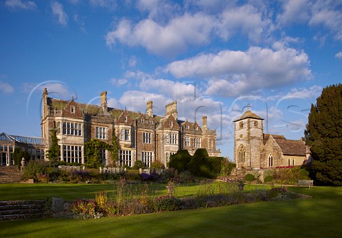 Wiston House and St Marys Church on Wiston Estate near Steyning Sussex England